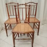 3 wooden and canning chairs