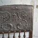 Pair of antique wooden and brown leather dining chairs, brass studs.