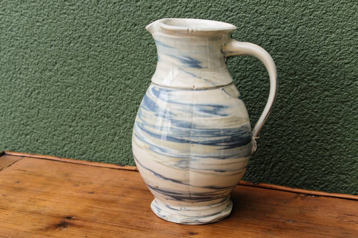 Water jug, signed, blue and white scrolls
