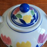 Antique teapot with flower pattern