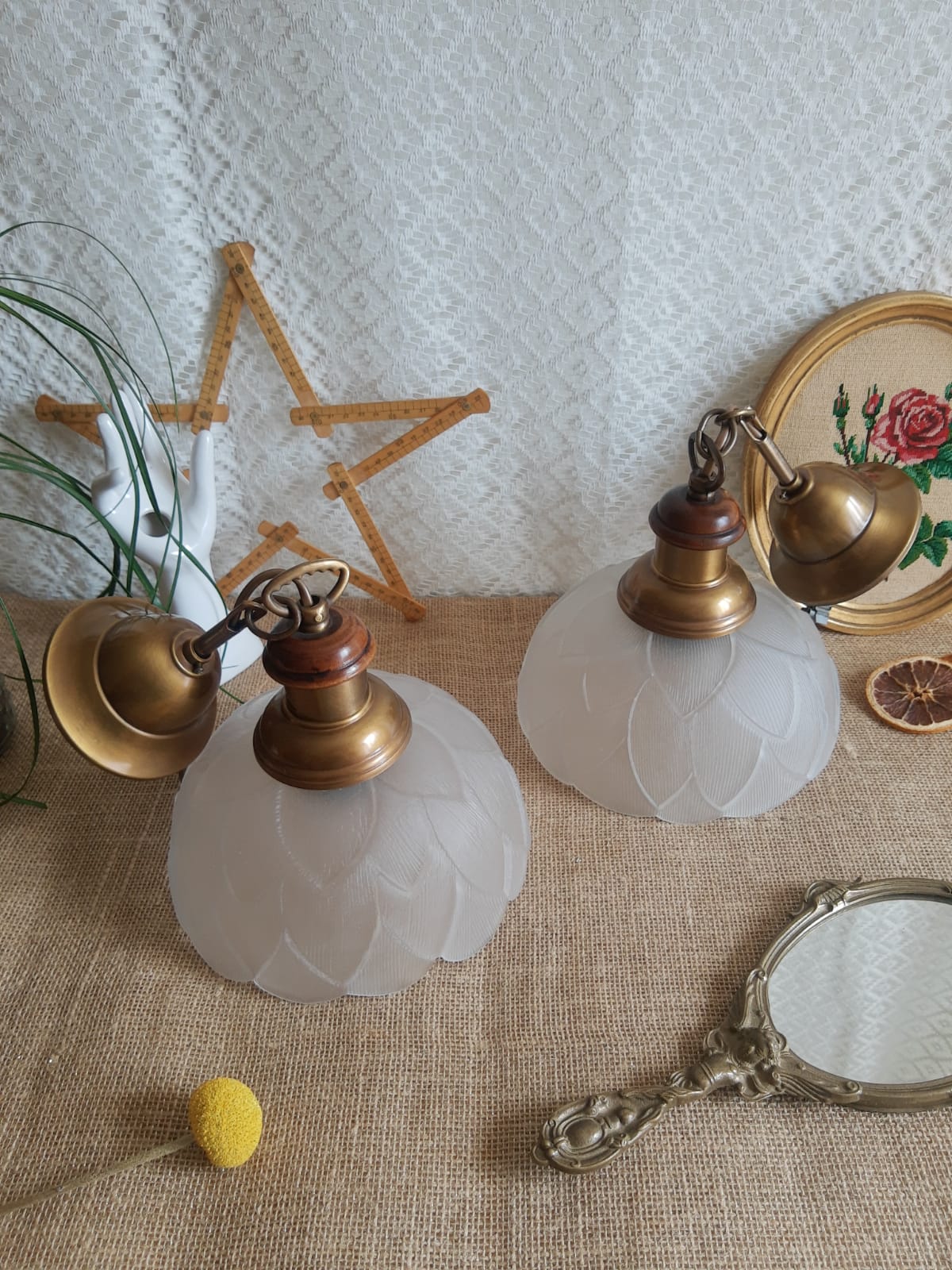 Pair of frosted glass flower pendant lights with vintage wood and brass