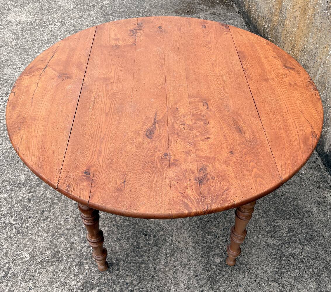 Round solid oak table with extensions, cabinetmaker's sliding mechanism,