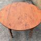 Round solid oak table with extensions, cabinetmaker's sliding mechanism,
