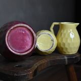 Raspberry carafe and two yellow pitchers
