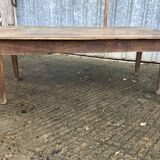 Antique farmhouse table in solid oak with tapered legs and 1 drawer at the end.