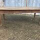 Antique farmhouse table in solid oak with tapered legs and 1 drawer at the end.
