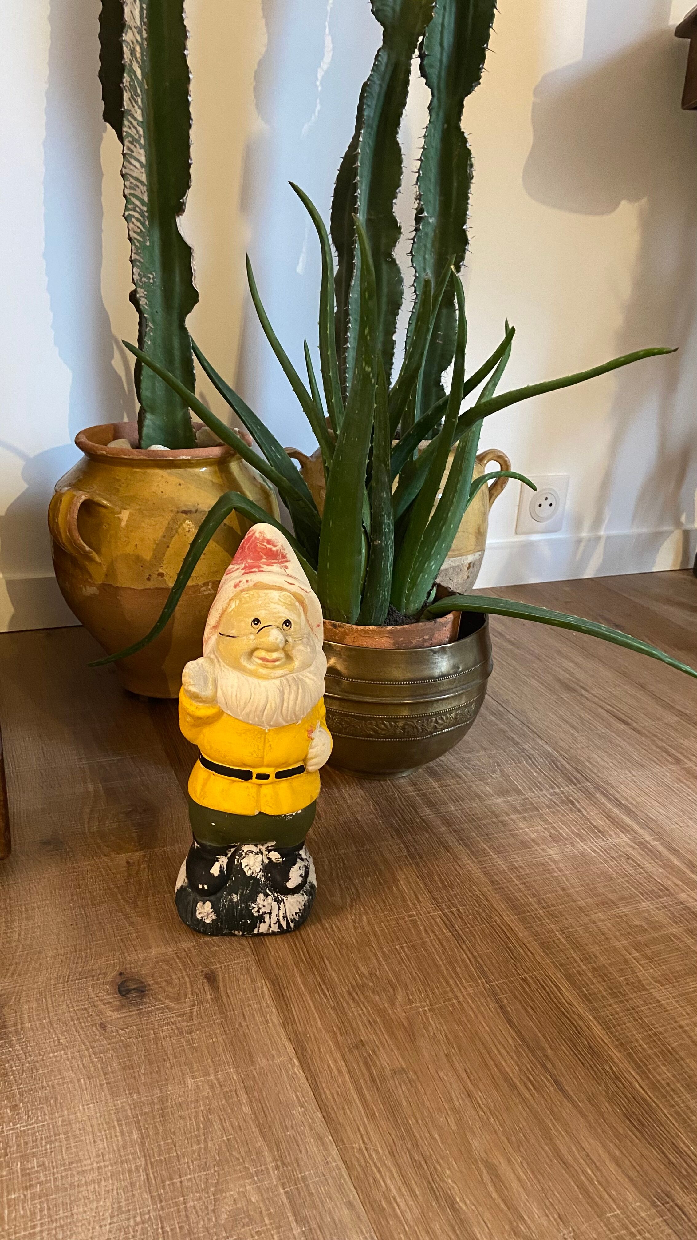 Ancient terracotta garden gnome