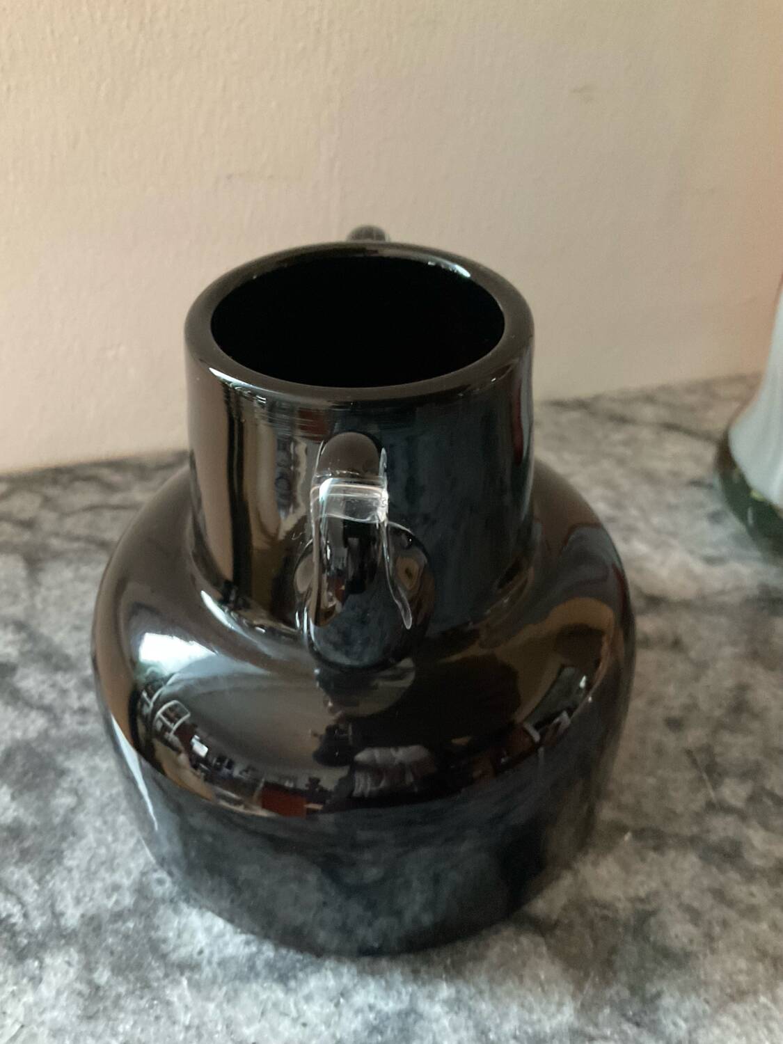 Two vintage ear vases made of Murano glass.