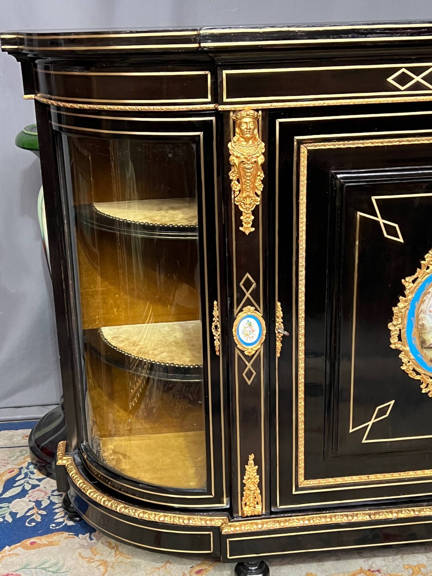 Napoleon III style credenza with four Sèvres medallions.
