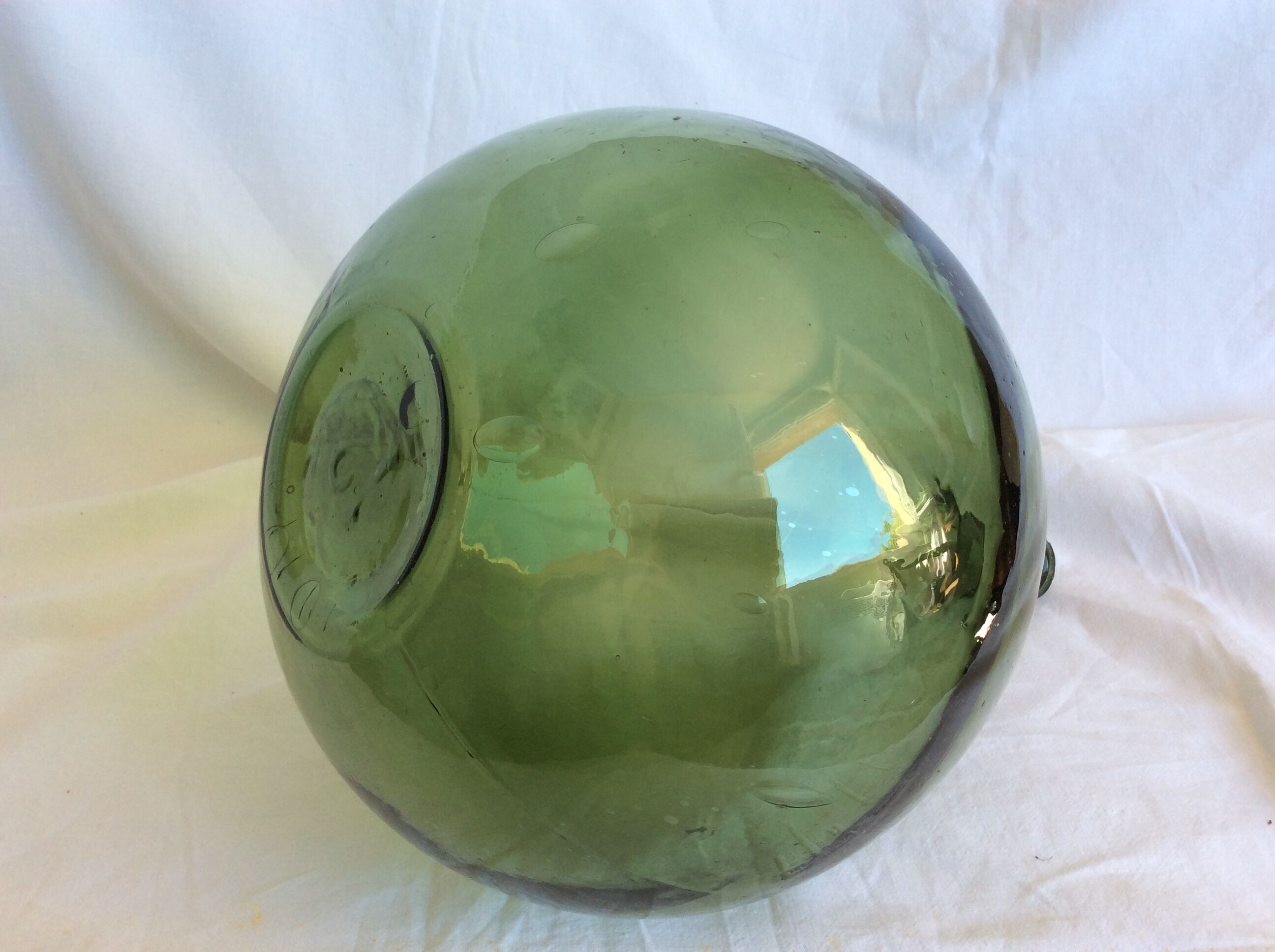 Former "lady jeanne" in blown glass, green bottle