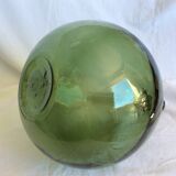 Former "lady jeanne" in blown glass, green bottle
