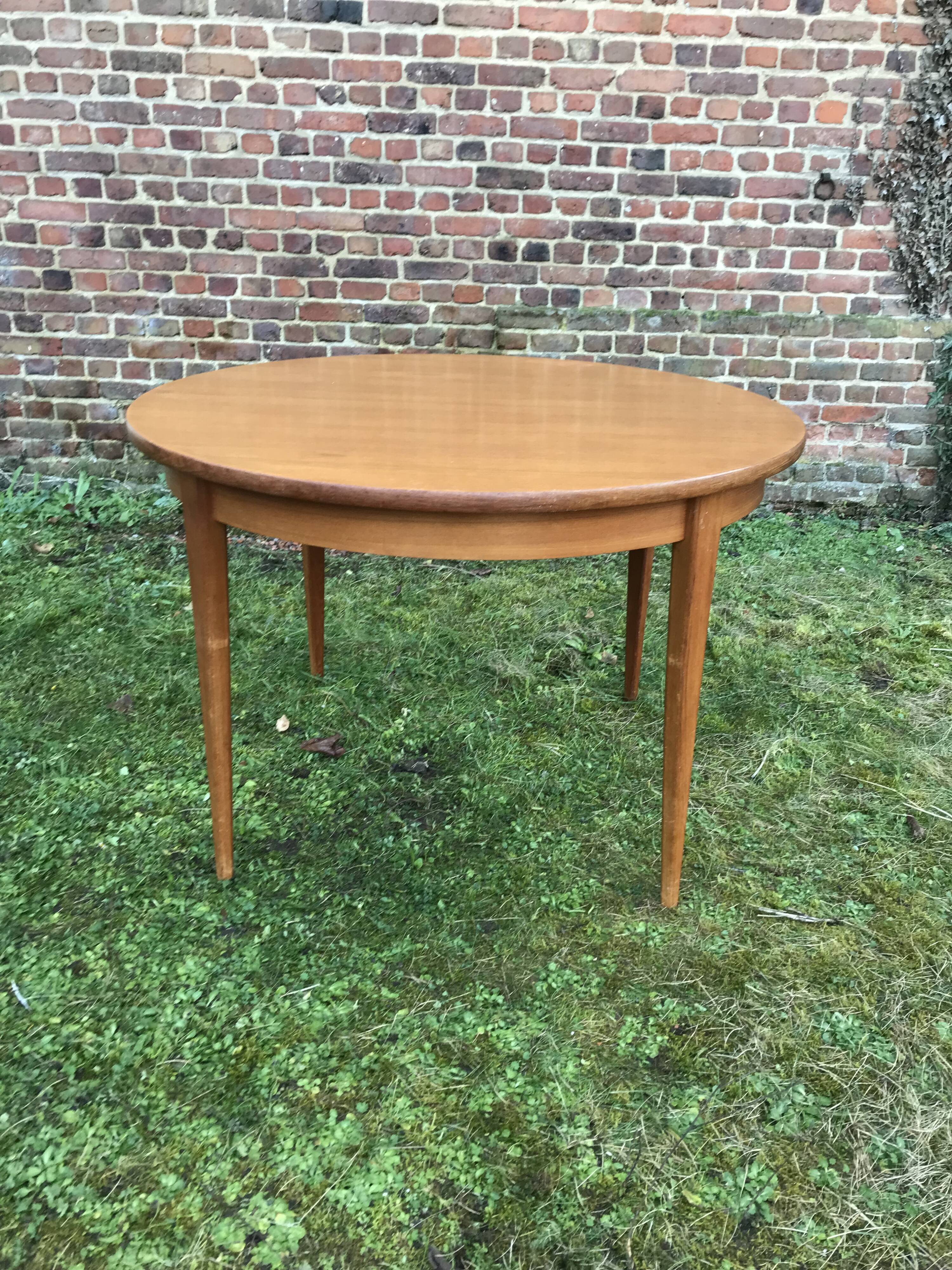 Extendable round vintage dining table