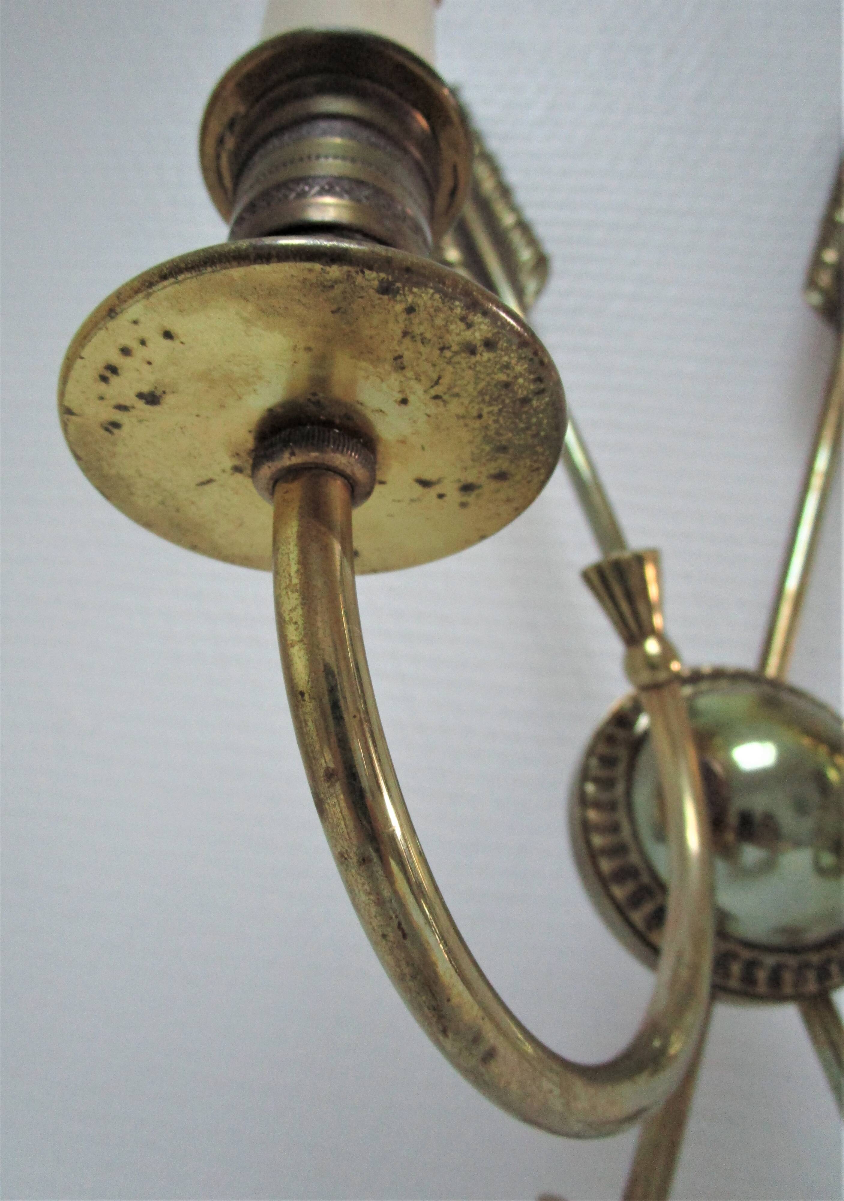 Pair of bronze crossed arrow wall lights Lucien Gau