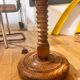 Oak floor lamp made of turned wood.