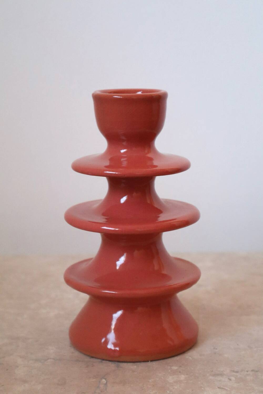 Dark pink ceramic candlestick