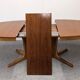 Oval extendable dining table by Baumann, France circa 1970.