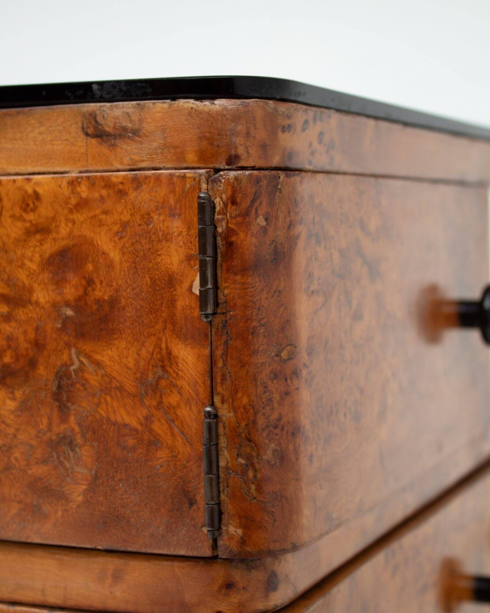 Pair of Art Deco nightstands in burlwood with black lacquered top