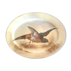 Plat peint en porcelaine de Limoges