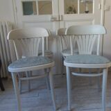 Set of 4 vintage bistro chairs enhanced in pearl grey.