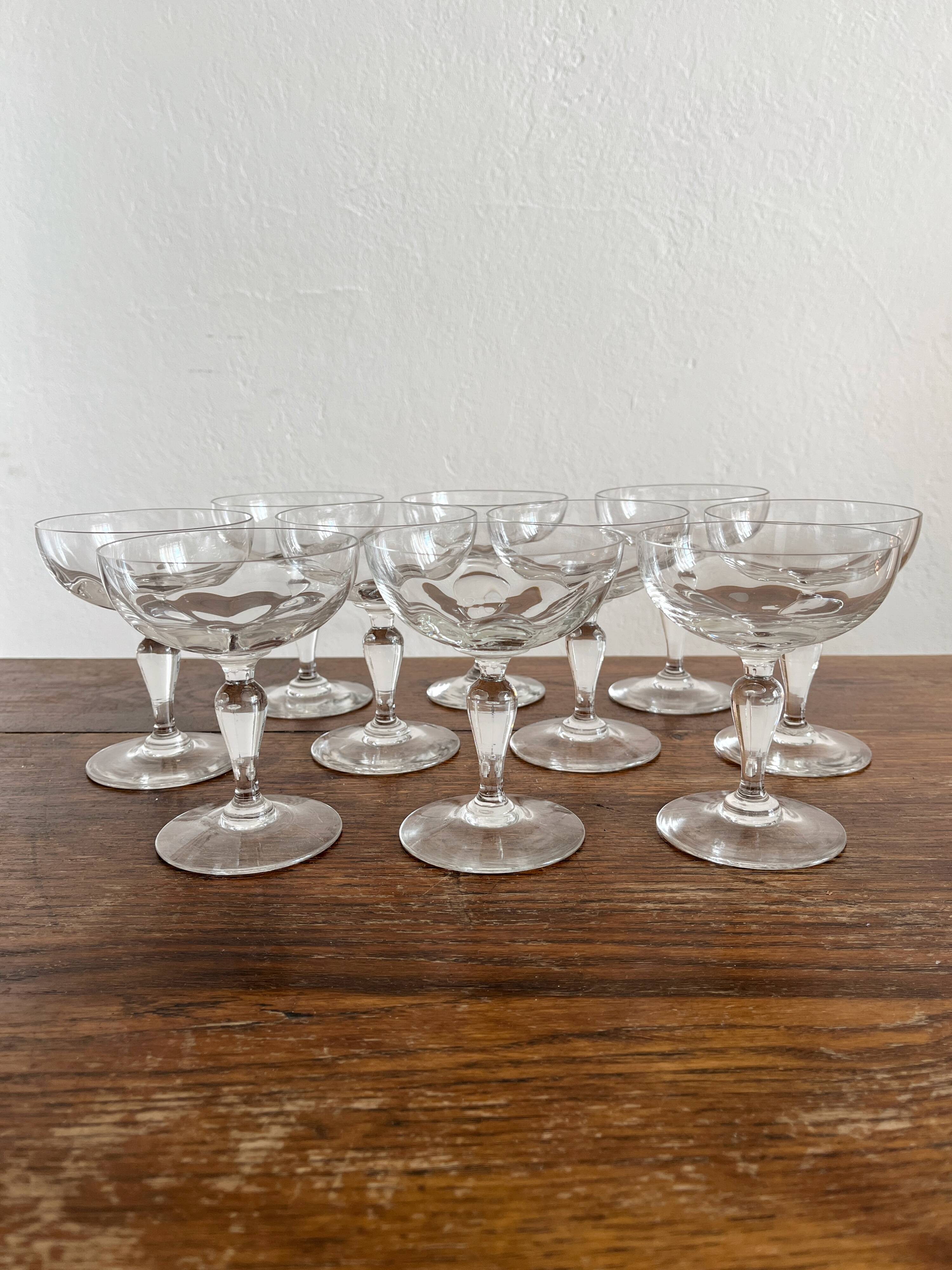 10 antique champagne glasses in blown glass, 19th century