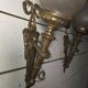 Pair of torch wall lights in Louis XVI style in 19th-century bronze.