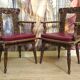 Pair of antique carved armchairs in Renaissance / Louis XIII / 19th century style.