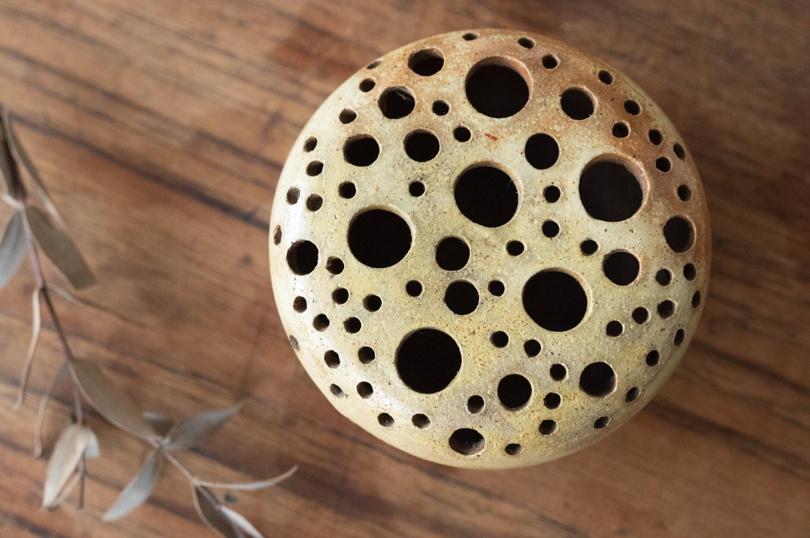 Signed sandstone flower pick