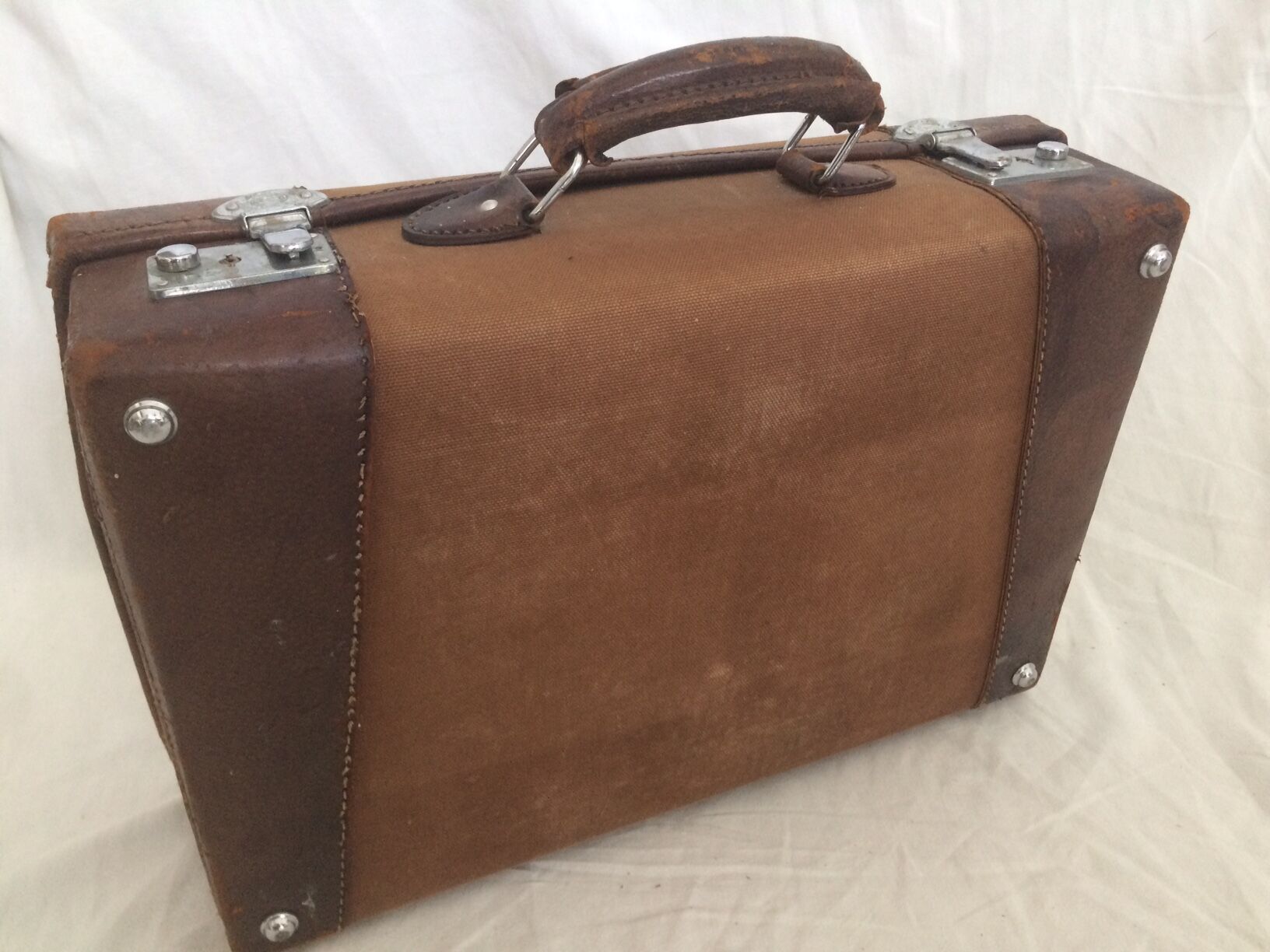 Cloth suitcase and leather vintage