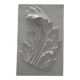 Plaster bas-relief depicting an acanthus leaf, inspired by Roman art.