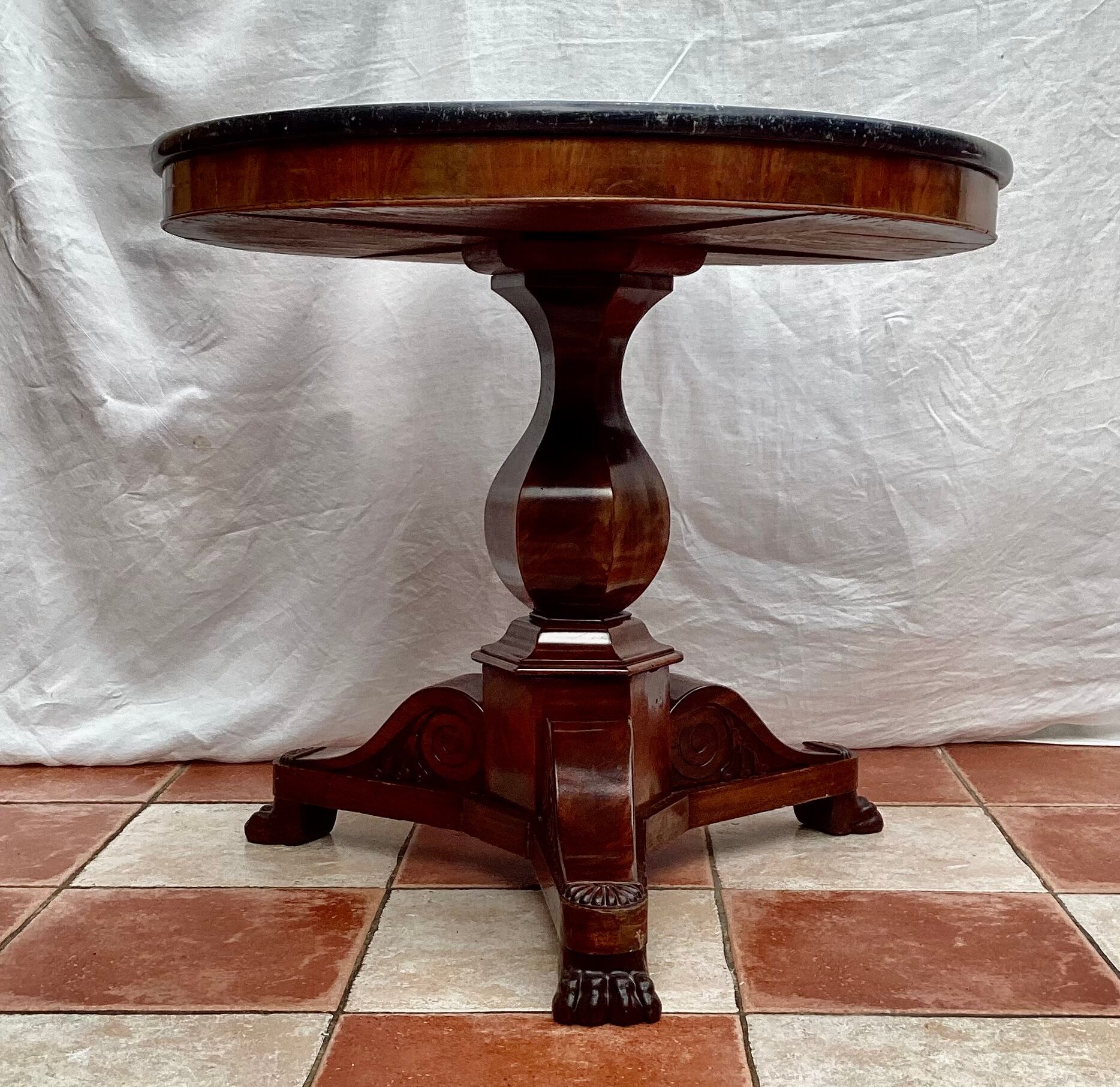Old pedestal table in oak wood with marble