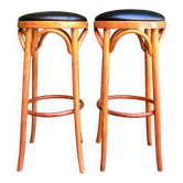 Curved wooden bar stools