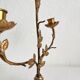Antique bronze and brass candlestick with golden leaves