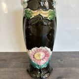 Antique ceramic vase by De Bruyn with floral decoration.