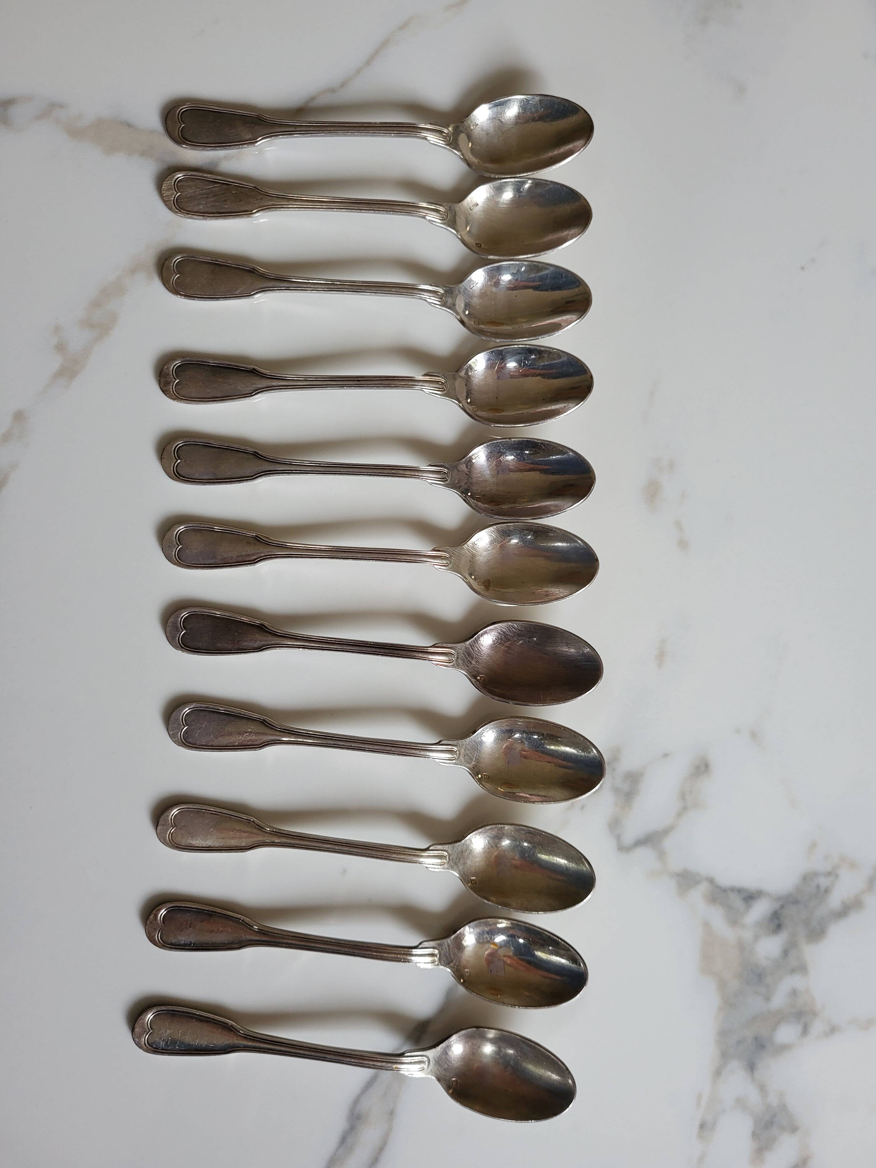 Series of 11 small silver-plated spoons