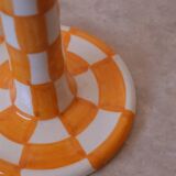 Pair of yellow and white checkered ceramic candlesticks