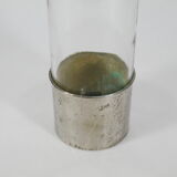 Bottle in glass and metal