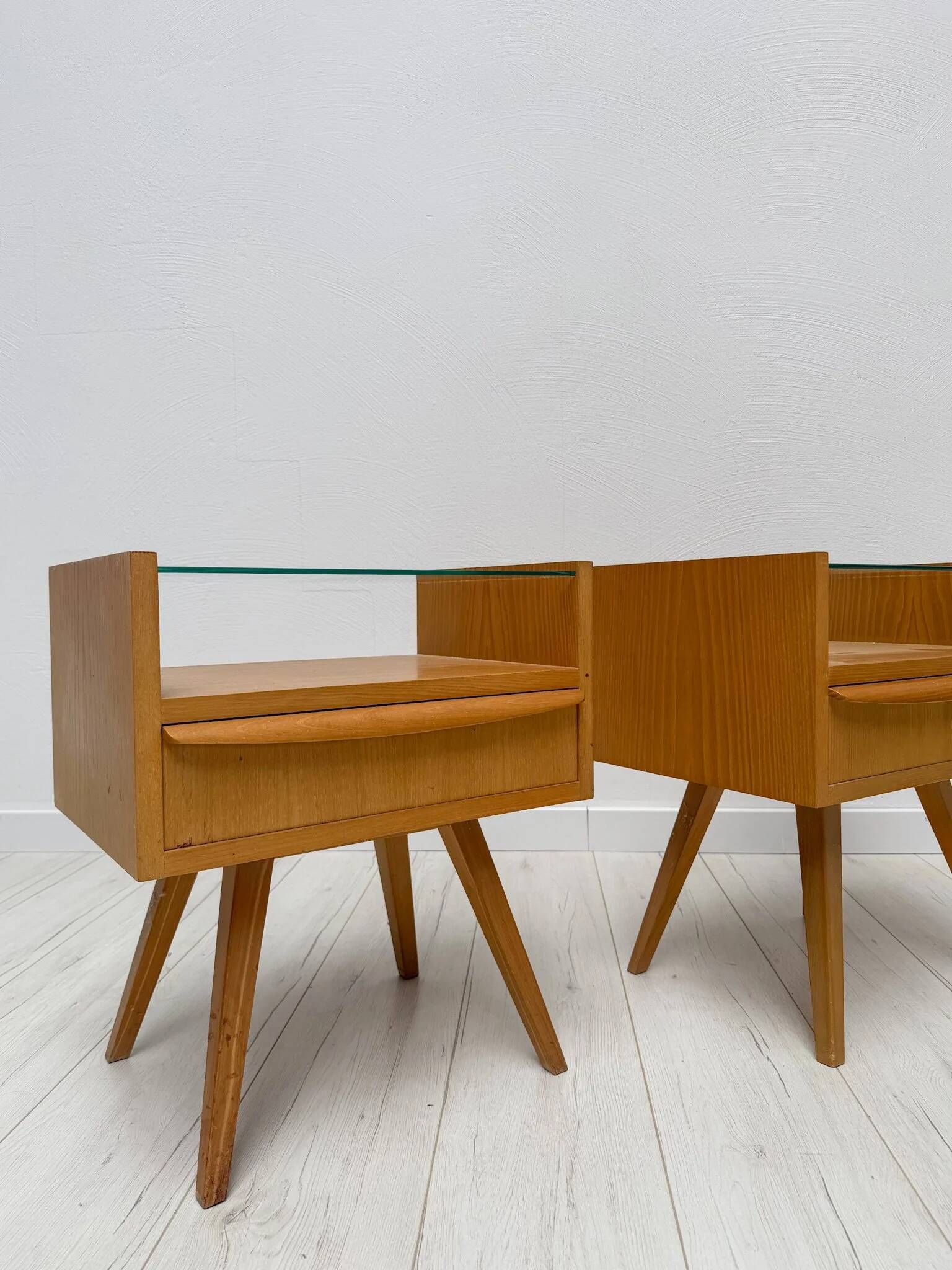 1960s vintage pair of mid-century walnut nightstands with glass shelves