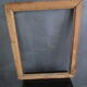 Large old frame in worked wood