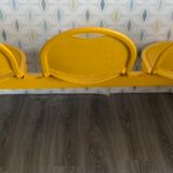 Yellow metal bench