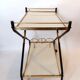 Rolling bar in gilded brass and black metal, Italy circa 1950