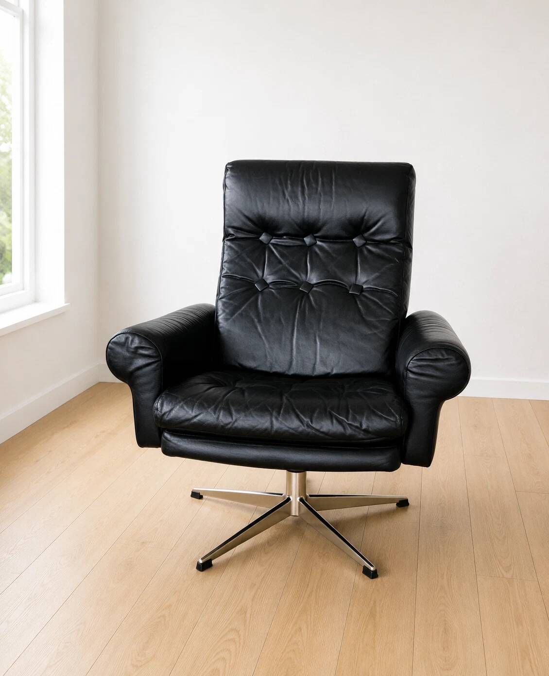 Vintage Danish mid-century black leather swivel chair 1970s