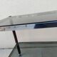 Vintage dessert table in wood, smoked glass, chrome metal, and wood.