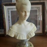 Bust woman on pedestal