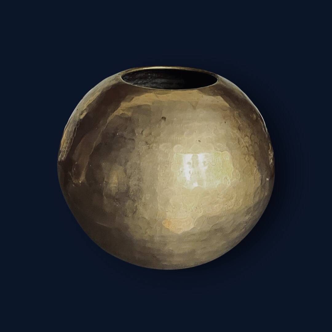 Antique decorative round vase in hammered brass