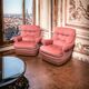 Pair of pink tufted velvet frog chairs from the 1970s.