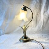 Old brass accent lamp in the shape of a flower