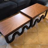 Nest of coffee tables in lacquer and rosewood veneer.