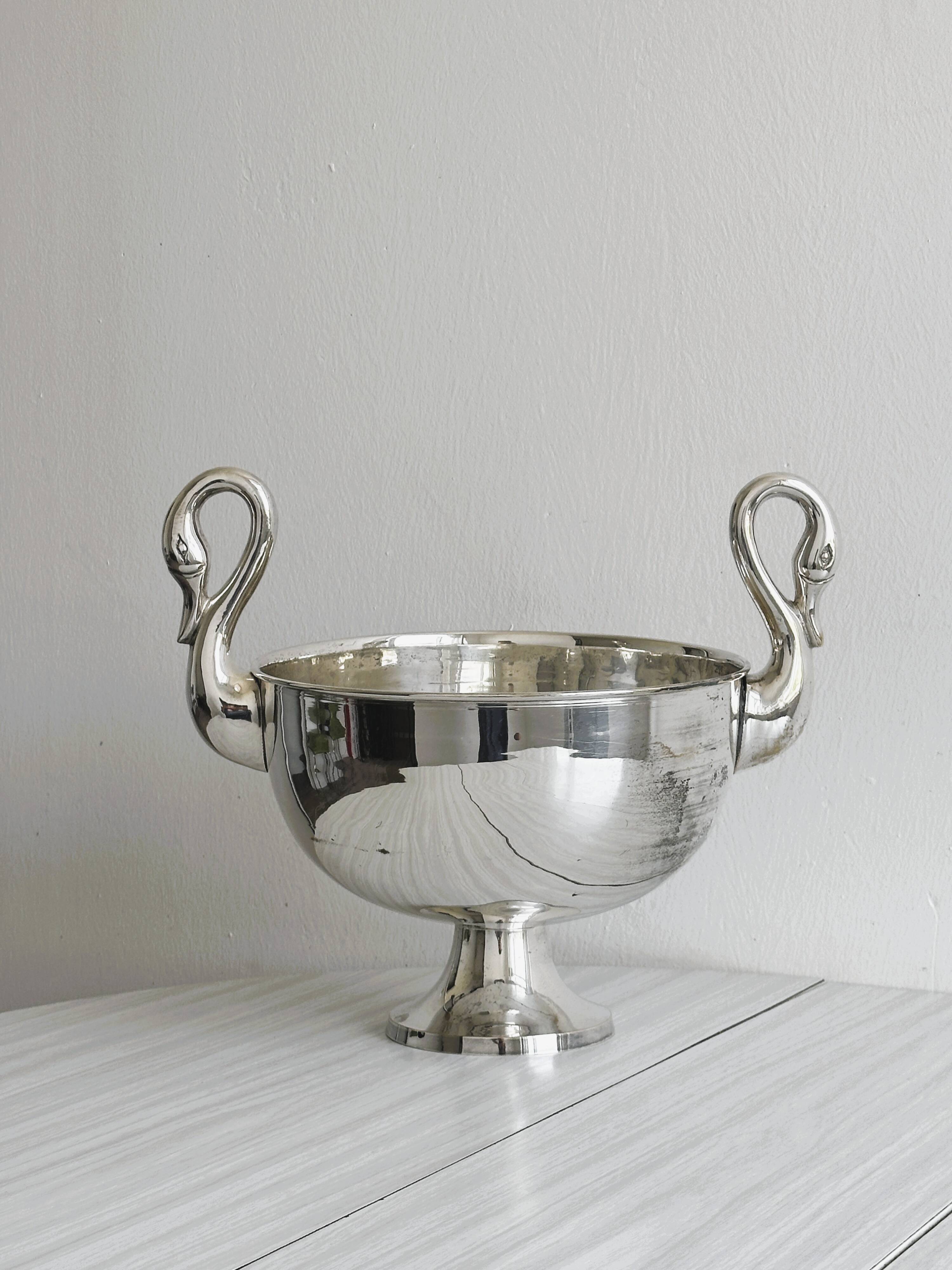 Large glass, metal champagne bucket