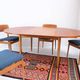 1960s/70s-style teak dining table by ASKO, with a retro vintage design.