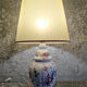 White ceramic lamp with floral decoration